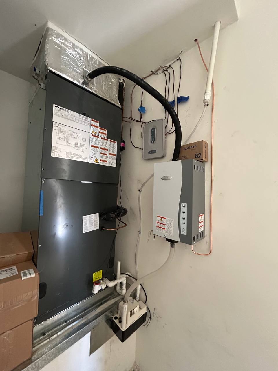 FAU with multi-zone control board and AprilAire 800 steam humidifier in a South La Quinta mechanical room