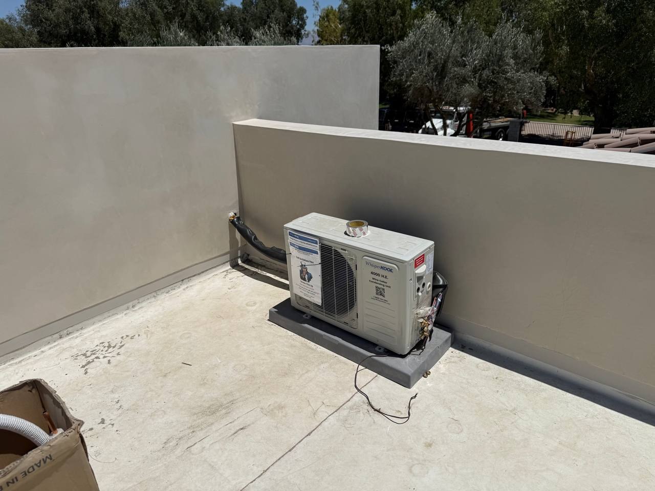 WhisperKOOL 4000 HE wine cellar condensing unit on the roof of a South La Quinta custom home