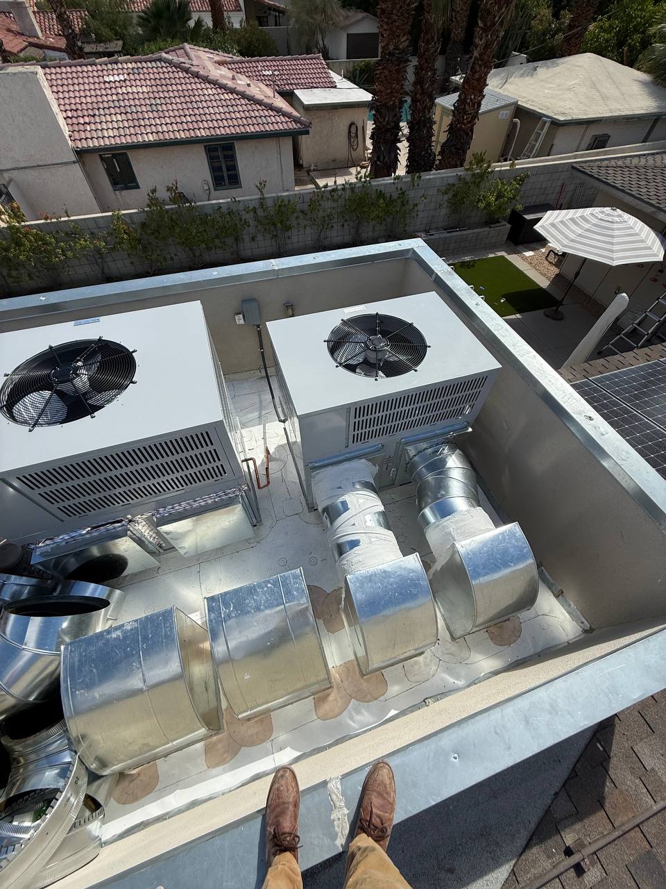 Bosch IDP units on new PVC roof — Palm Springs HVAC retrofit